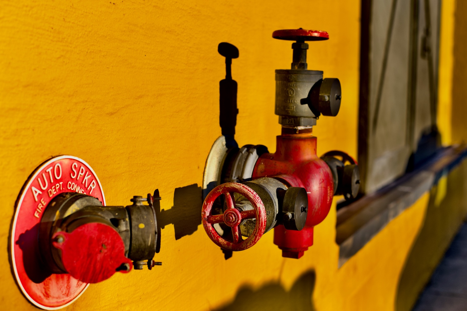 pipes on the side of a wall