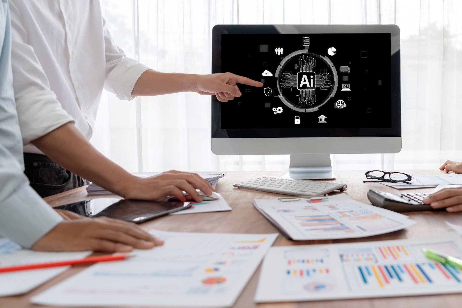 team planning session with AI written on a computer screen