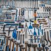 Dozens of workshop tools laid out in an orderly fashion