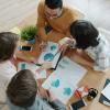 a team at a table discussing a project 
