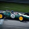 green car racing on a track