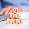 ai building blocks next to a laptop