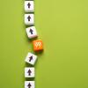 a row of cubes with a roadblock cube in the middle